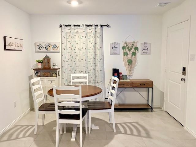 464 Reverie Way Ferris, TX 75125 - Photo 7 of 21 a dining room with furniture and window