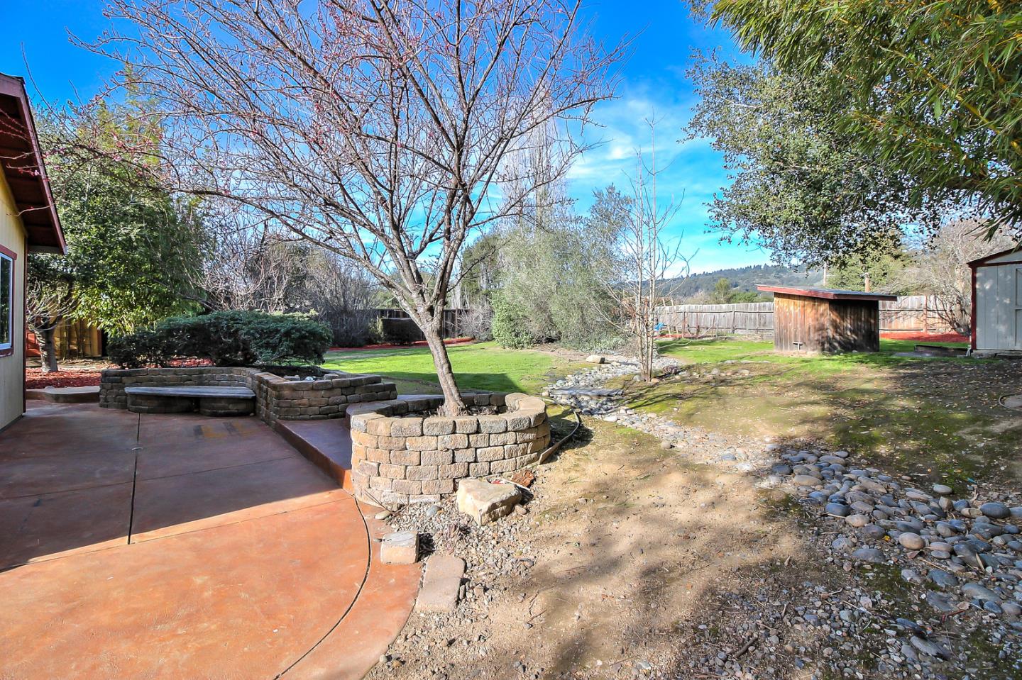 30 Heiner Road Watsonville, CA 95076 - Photo 35 of 50 a view of a backyard with a garden and trees
