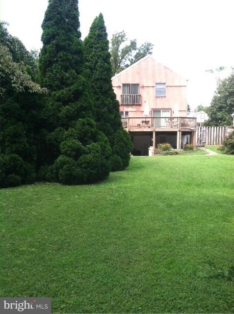 611 North Stuart Street Baltimore, MD 21221 - Photo 19 of 21 Rear Yard View of the Deck and Patio