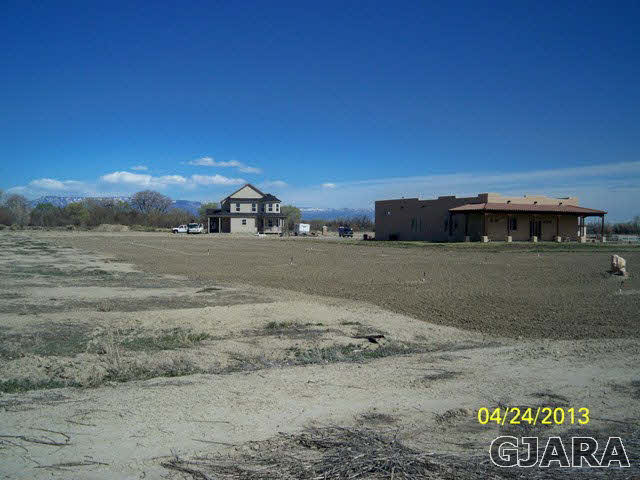 820 Mease Road Grand Junction, CO 81505 - Photo 5 of 7 a view of a house with a yard