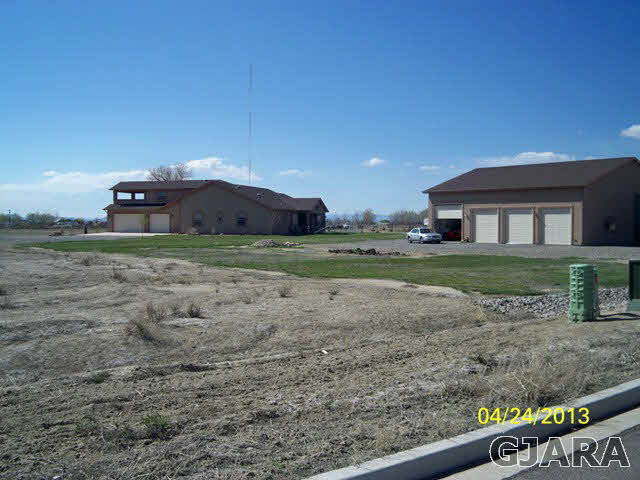 820 Mease Road Grand Junction, CO 81505 - Photo 7 of 7 a front view of a house with a yard