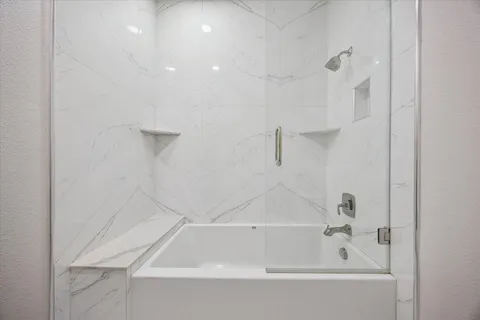 a bathroom with a bathtub