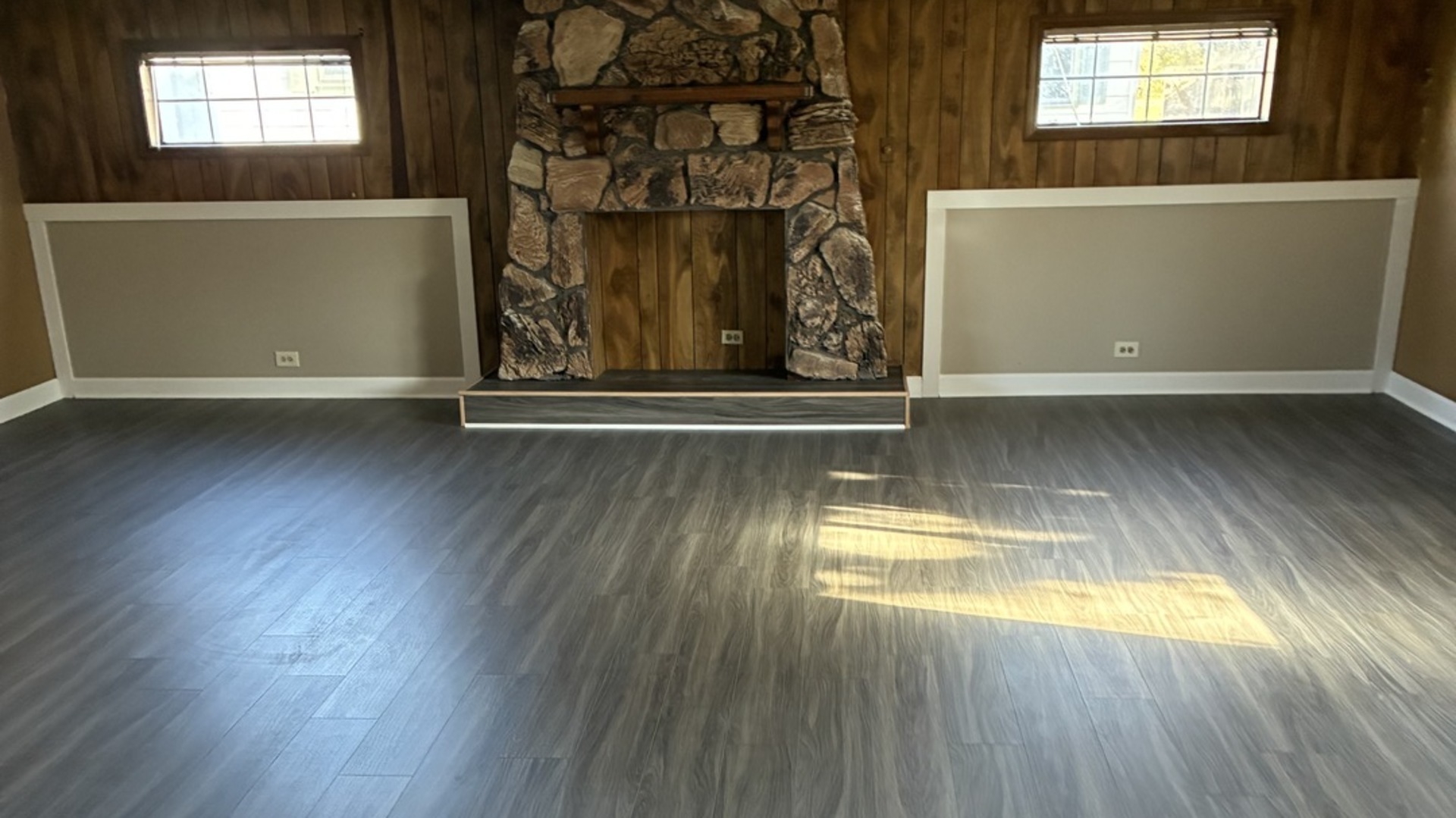 315 East Corning Road Beecher, IL 60401 - Photo 14 of 16 an empty room with wooden floor and windows