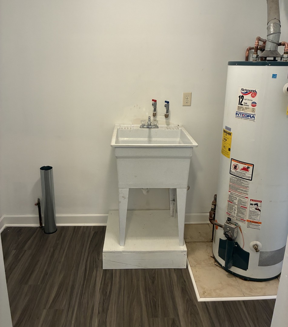 315 East Corning Road Beecher, IL 60401 - Photo 16 of 16 a living room with a fireplace and wooden floor