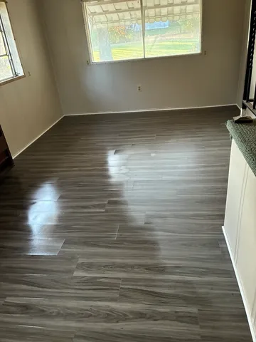 a view of kitchen with marble wall