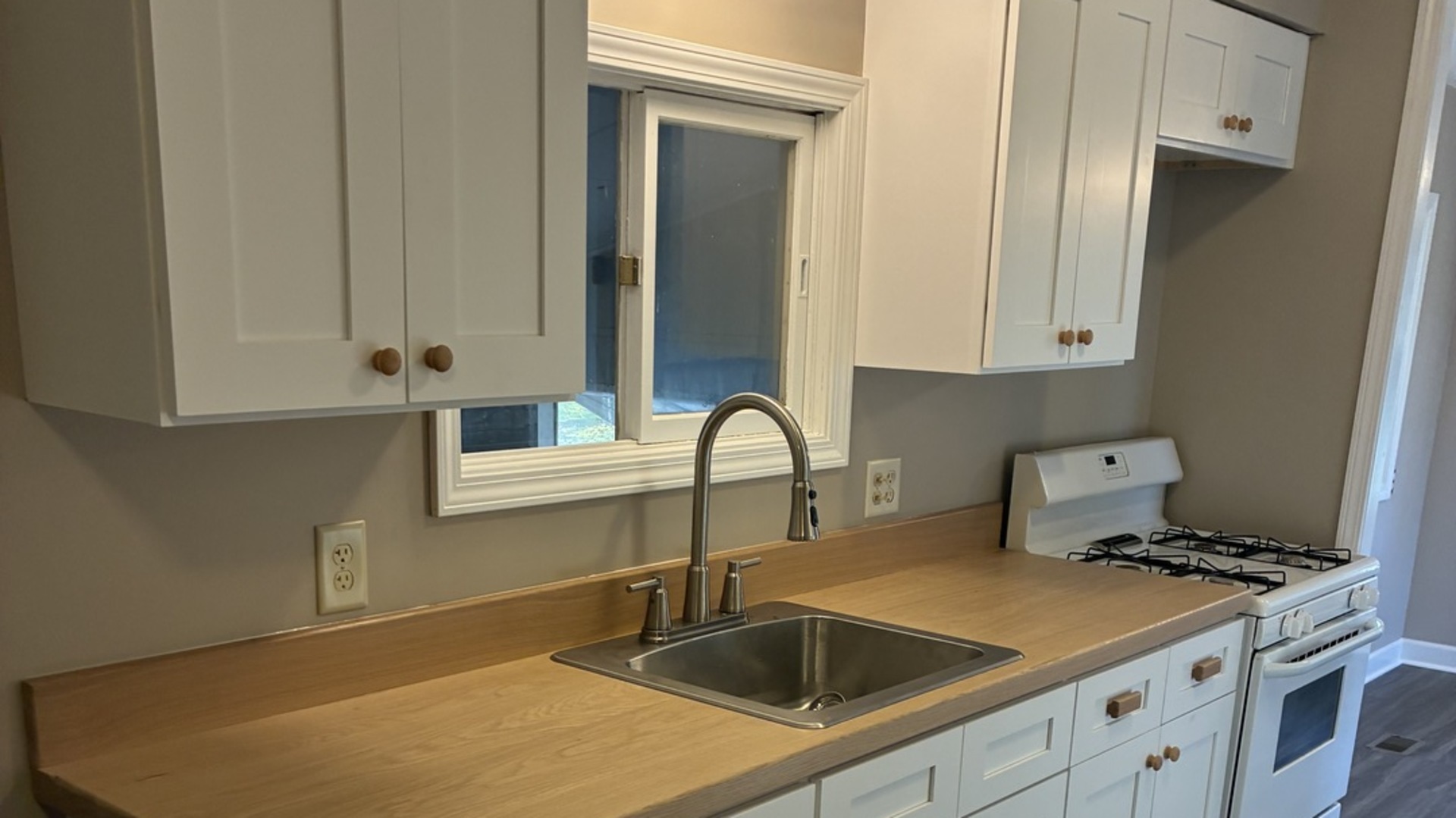315 East Corning Road Beecher, IL 60401 - Photo 7 of 16 a kitchen with a sink cabinets and appliances