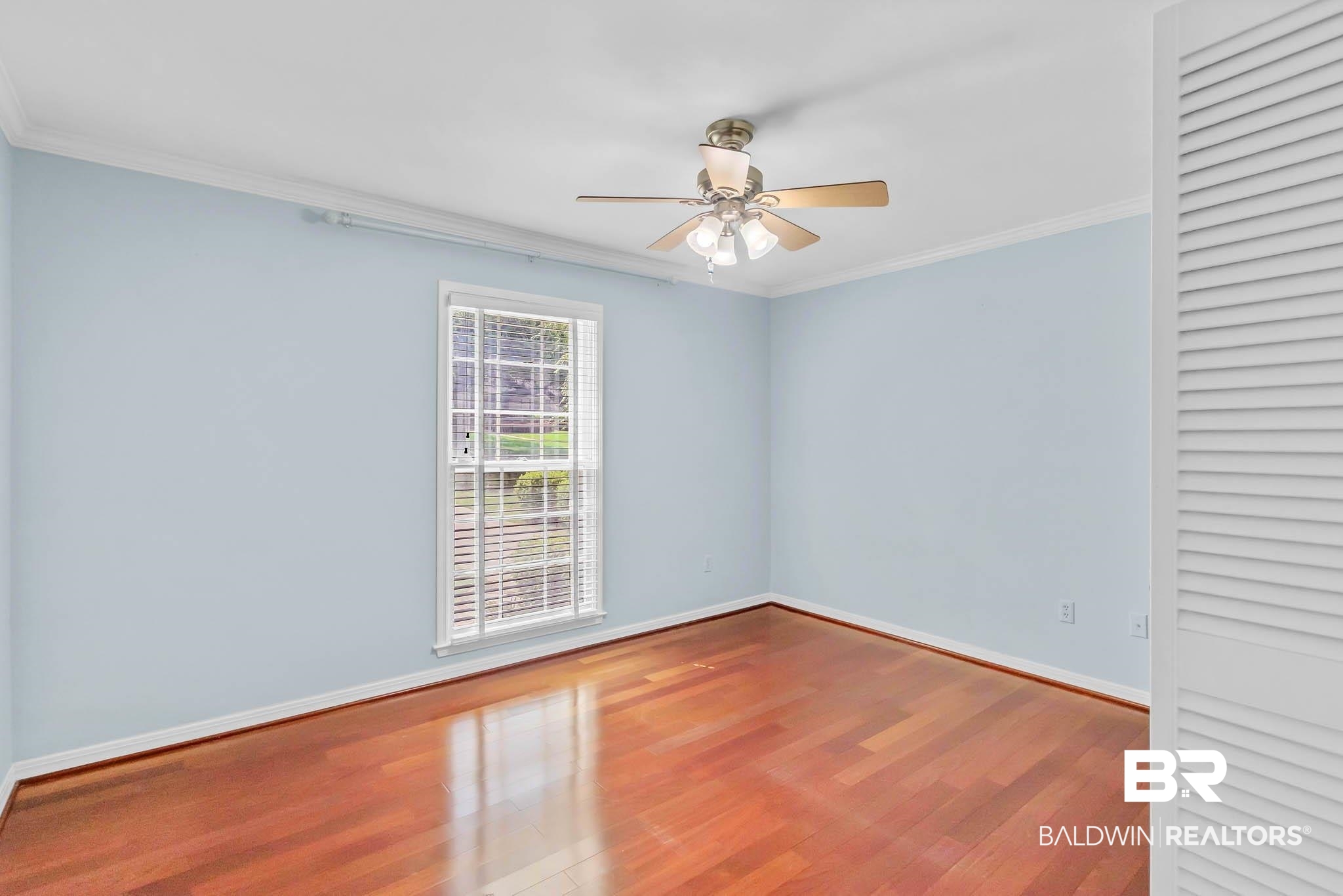 309 West Brandy Run Road Mobile, AL 36608 - Photo 50 of 100 Spare room with ornamental molding, wood finished floors, and a ceiling fan