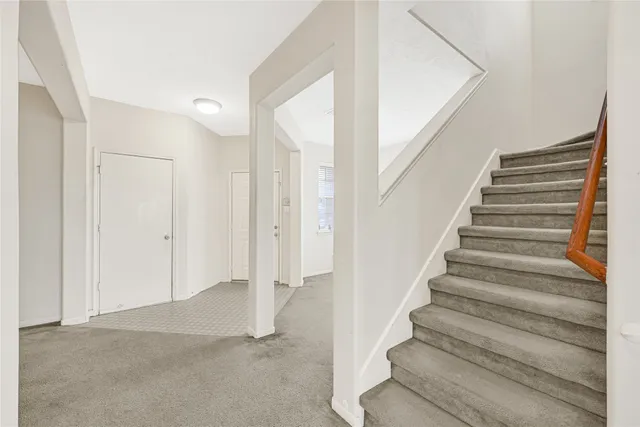 a view of an entryway with staircase