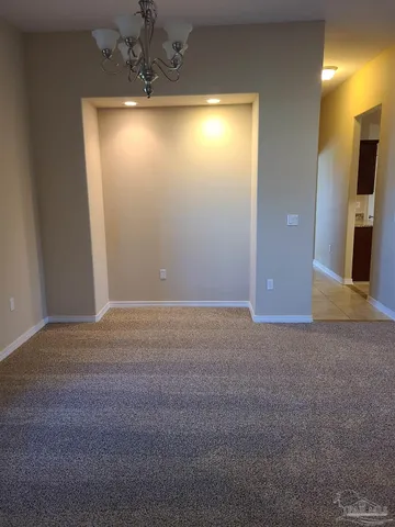 a view of a livingroom with a flat screen tv