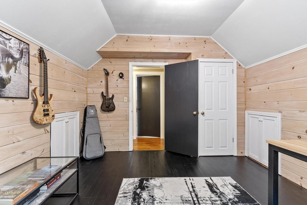 167 Gates Pond Road Berlin, MA 01503 - Photo 25 of 32 a view of walk in closet with clothes and shoes