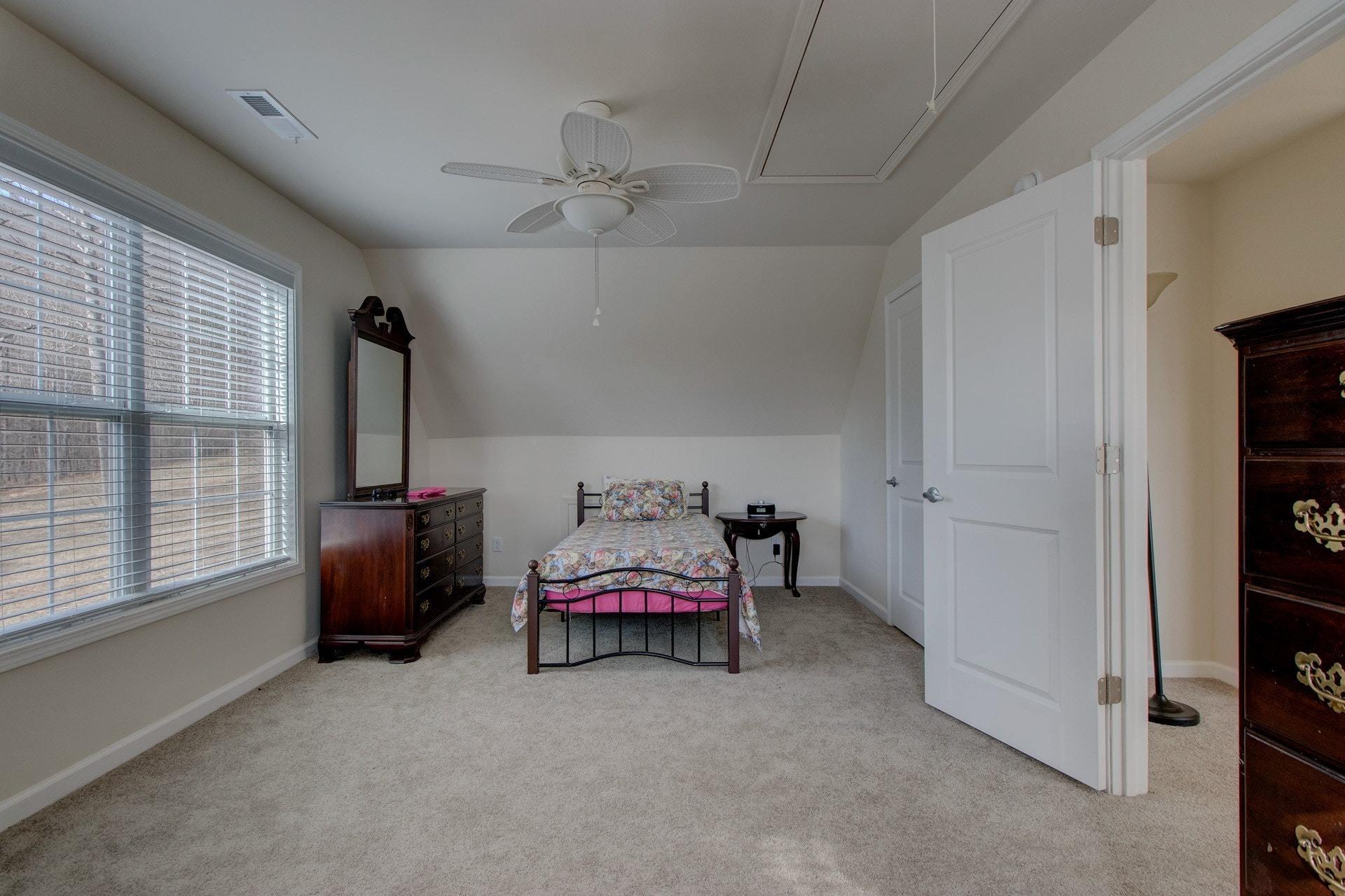 1381 Nemmo Road Vinton, VA 24179 - Photo 25 of 39 a bedroom with furniture and a window