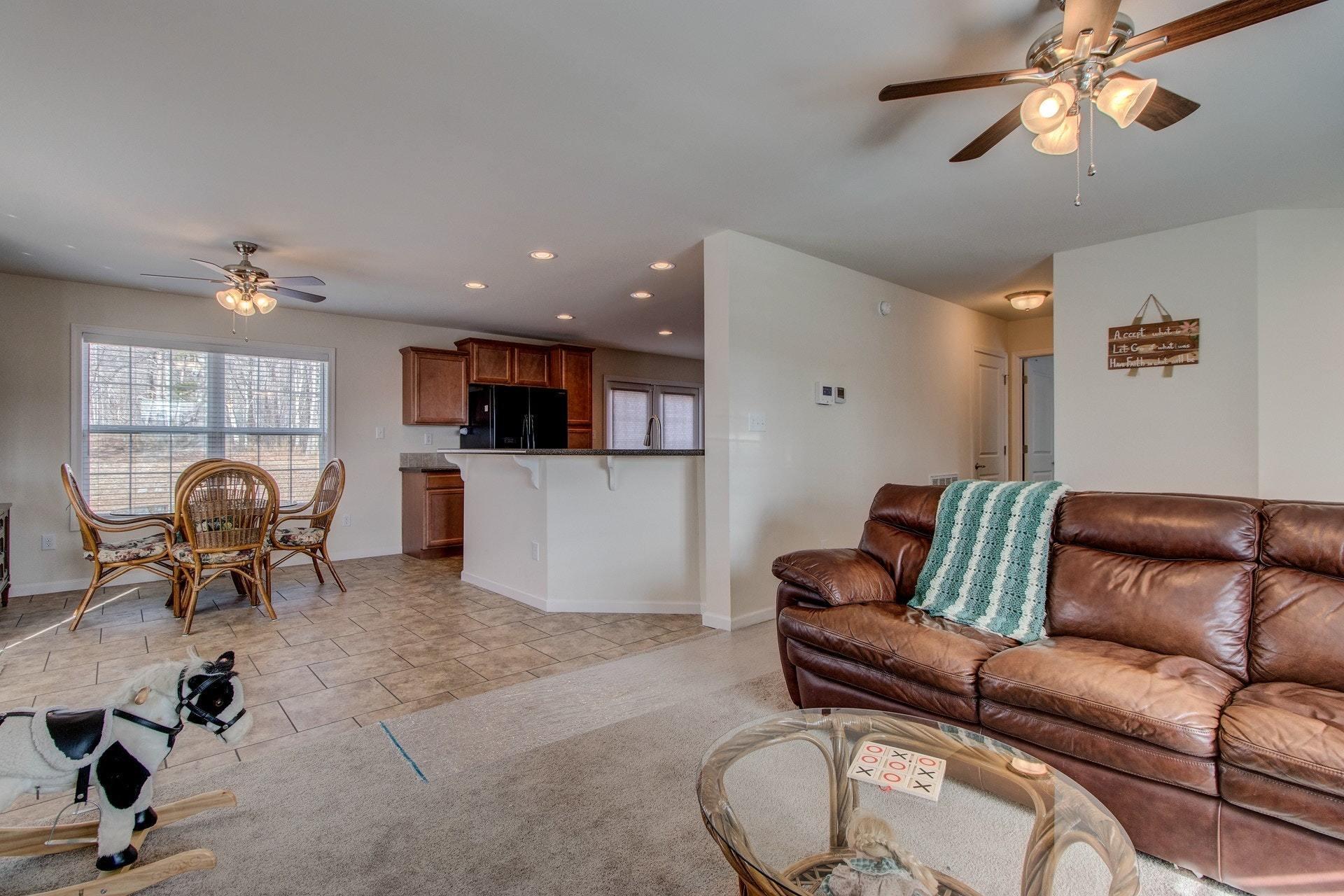 1381 Nemmo Road Vinton, VA 24179 - Photo 8 of 39 a living room with furniture and a flat screen tv