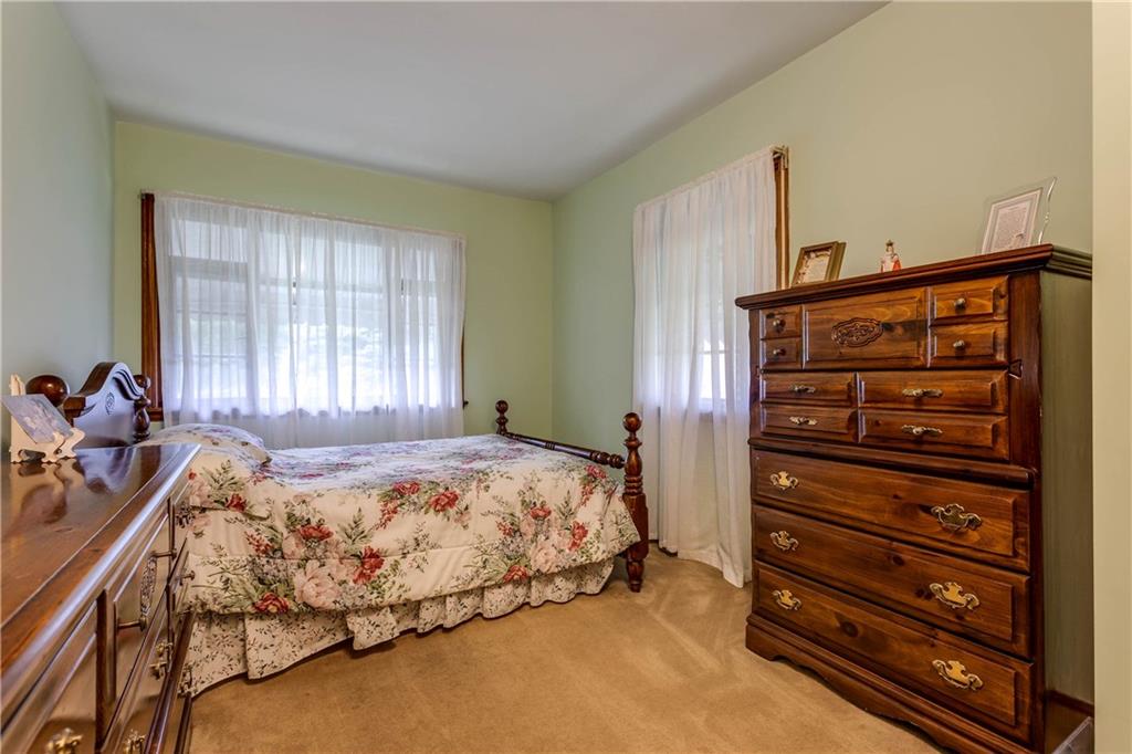 5 Spring Valley Street Slovan, PA 15078 - Photo 16 of 21 Another bedroom with windows and lots of space for furniture.