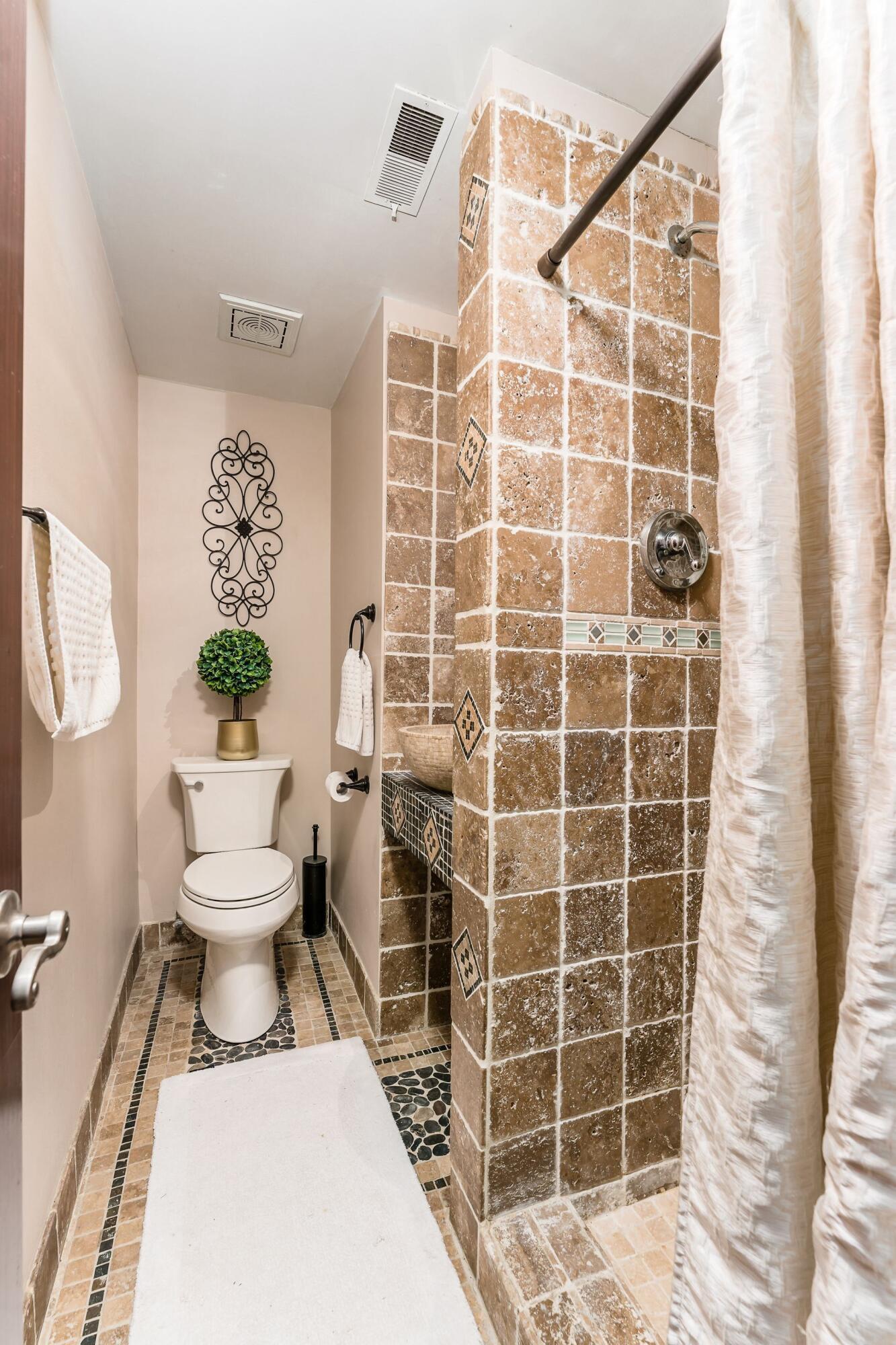 7080 Rieber Street Columbus, OH 43085 - Photo 36 of 55 Full Bathroom in basement with nice tilework!