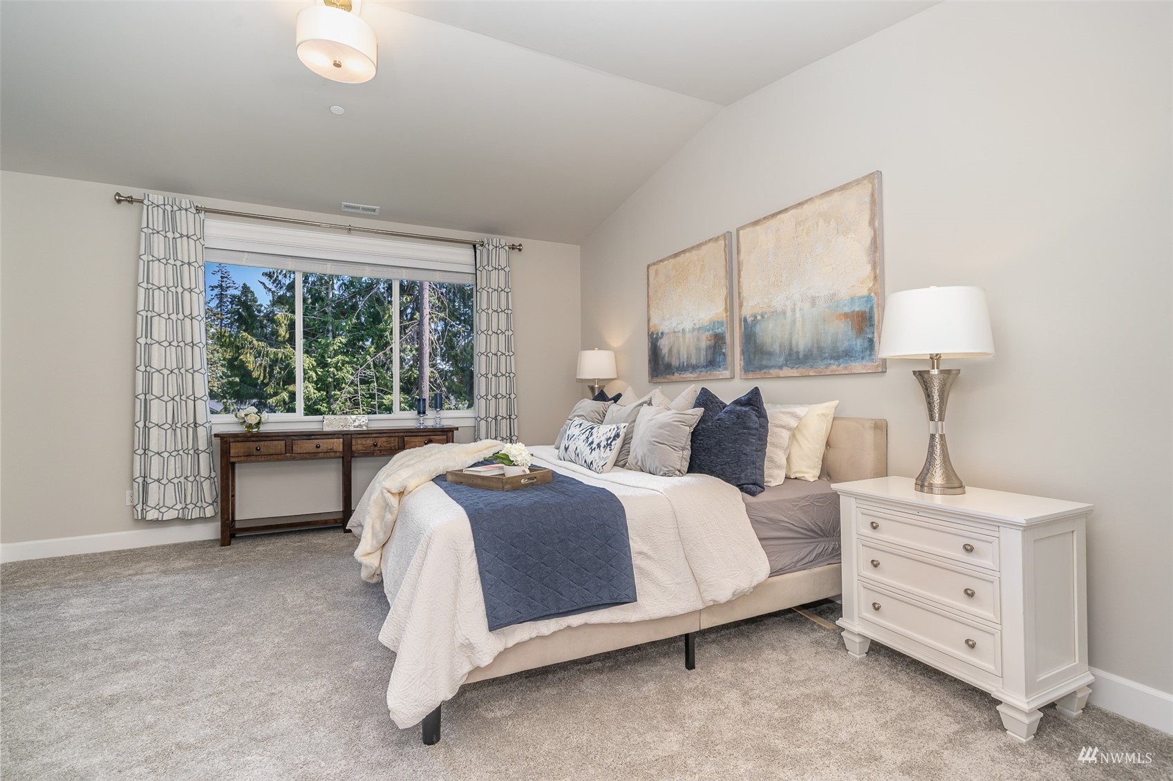 23907 1st Avenue Southeast Bothell, WA 98021 - Photo 15 of 32 a bed room with a bed and a window