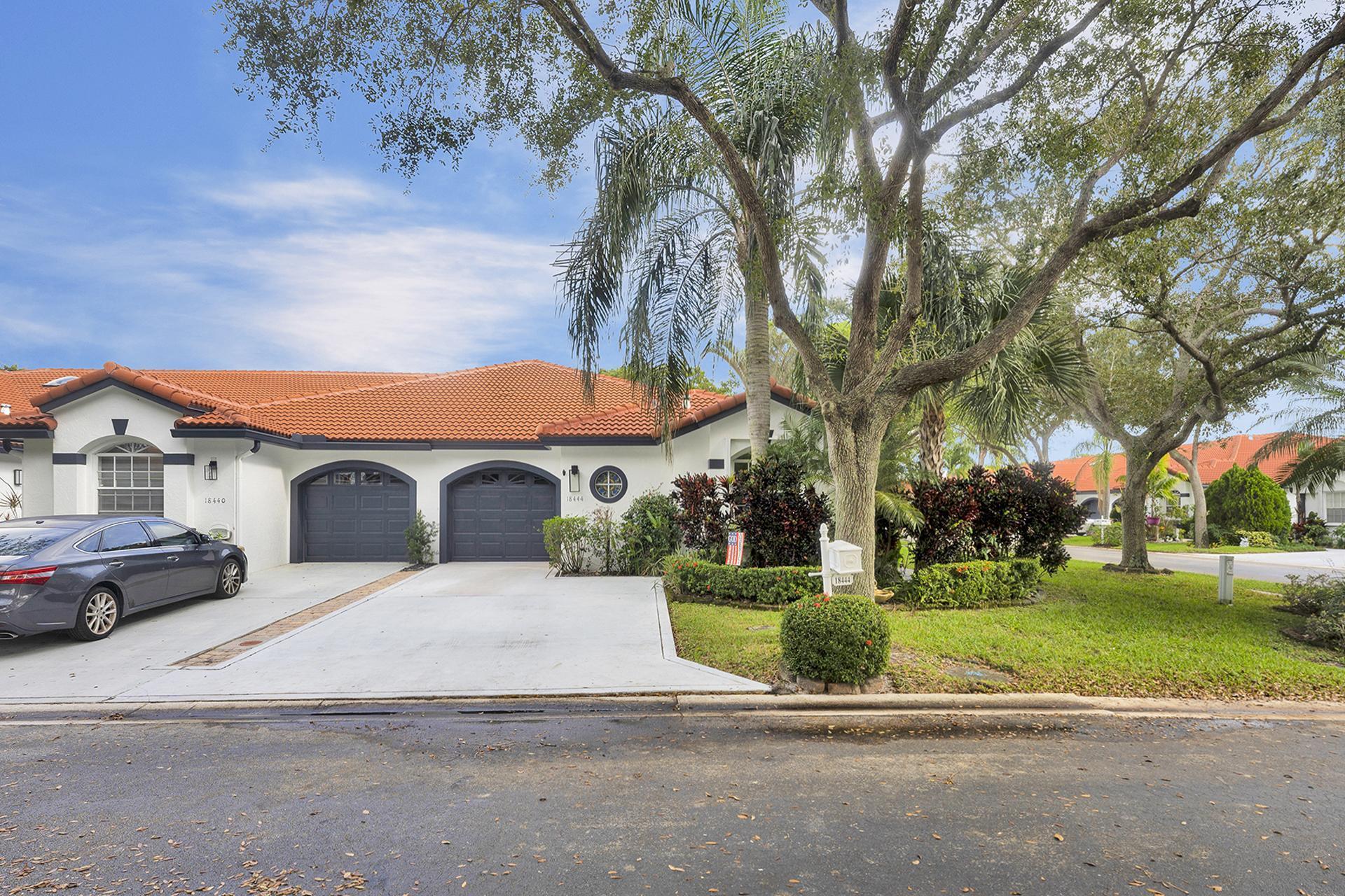 18444 Vía Di Regina Boca Raton, FL 33496 - Photo 4 of 56 front of the house