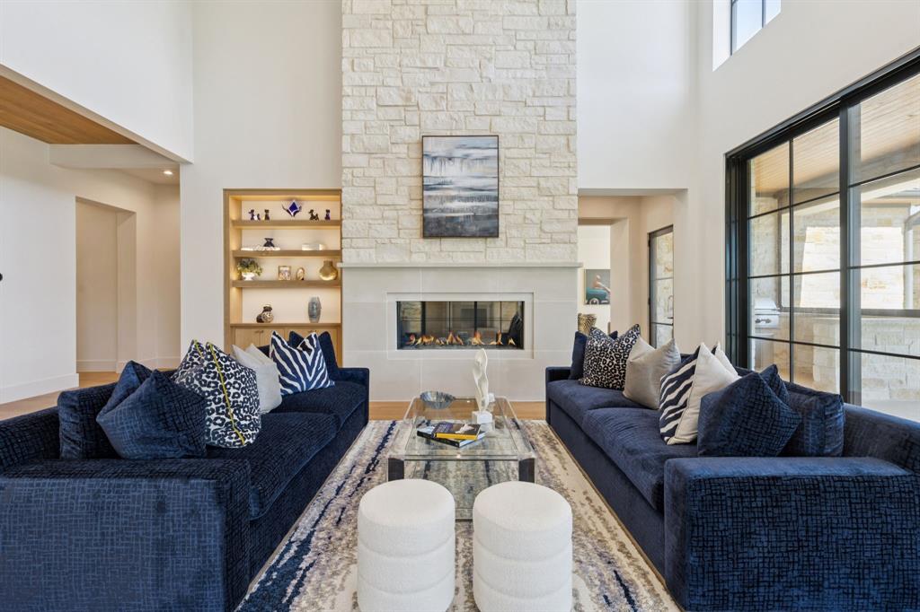 2600 Magnolia Circle Roanoke, TX 76262 - Photo 12 of 39 a living room with furniture and a fireplace