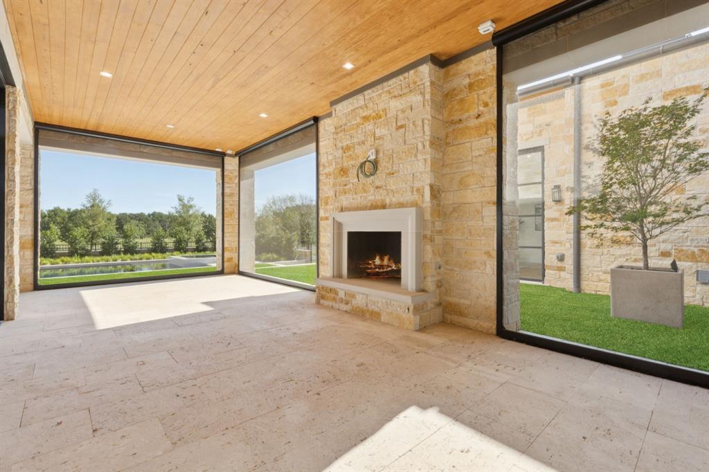 2600 Magnolia Circle Roanoke, TX 76262 - Photo 34 of 39 a view of a fireplace with a large window