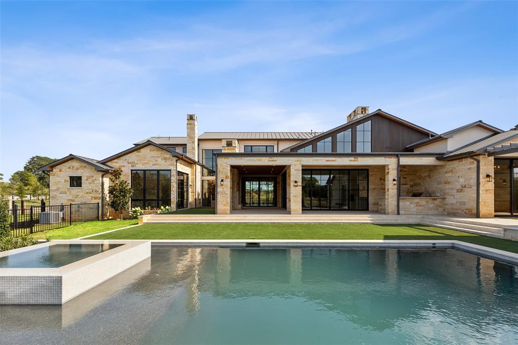 2600 Magnolia Circle Roanoke, TX 76262 - Photo 35 of 39 a front view of a house with swimming pool having outdoor seating