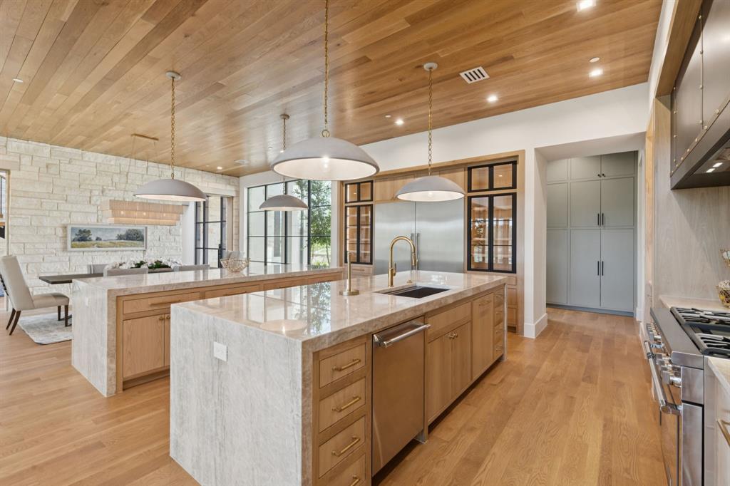 2600 Magnolia Circle Roanoke, TX 76262 - Photo 10 of 39 a large white kitchen with a large window