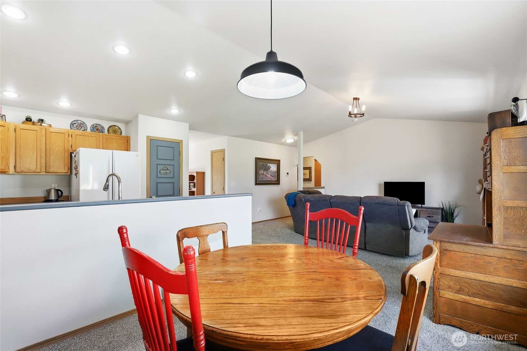 8008 188th Avenue Southwest Rochester, WA 98579 - Photo 12 of 40 a dining room with furniture and wooden floor
