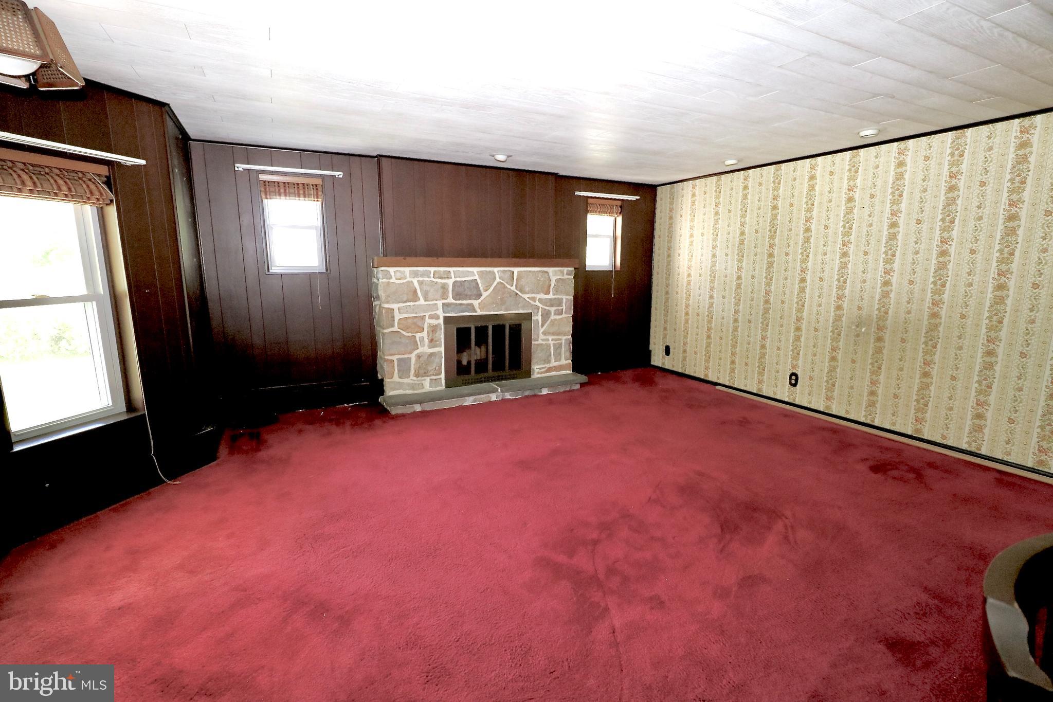 257 Valley Road Birdsboro, PA 19508 - Photo 10 of 21 LIVING ROOM STONE FIREPLACE WOODBURNING