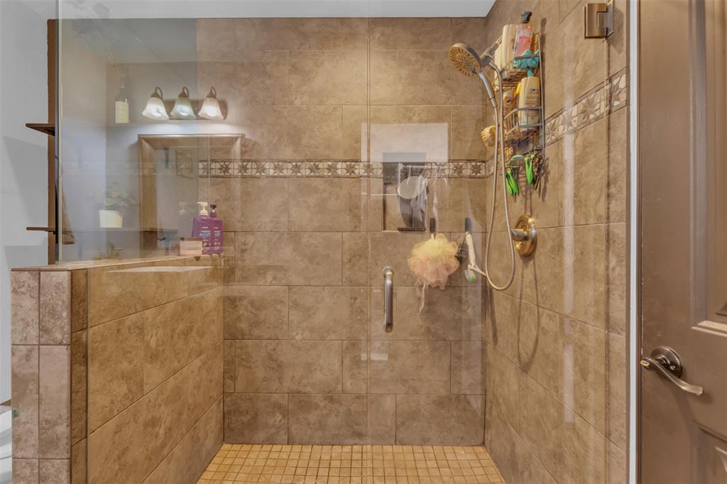 906 Griffith Avenue Terrell, TX 75160 - Photo 24 of 37 a bathroom with a shower