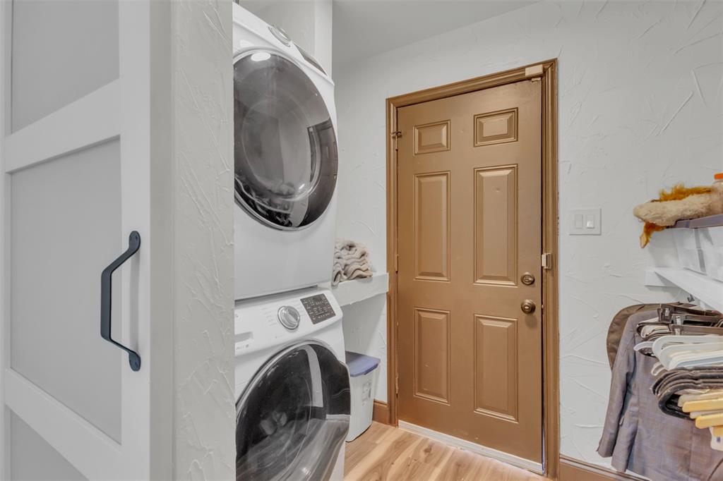 906 Griffith Avenue Terrell, TX 75160 - Photo 29 of 37 a view of a storage and utility room with washer and dryer