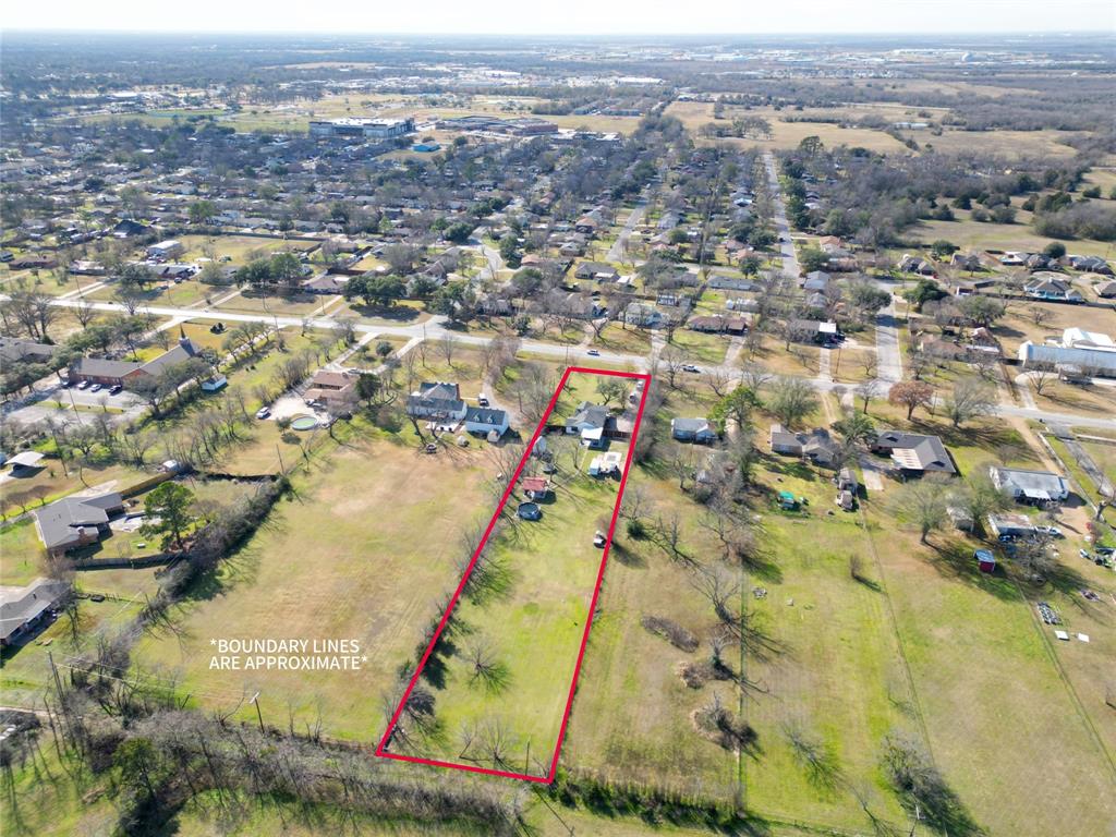906 Griffith Avenue Terrell, TX 75160 - Photo 37 of 37 an aerial view of residential building and parking space