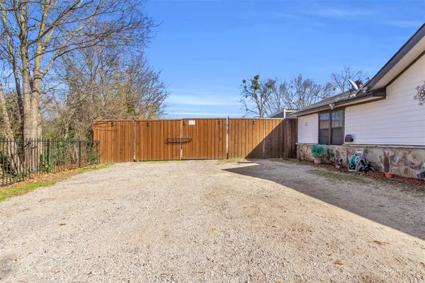 a house with a tree in front of it