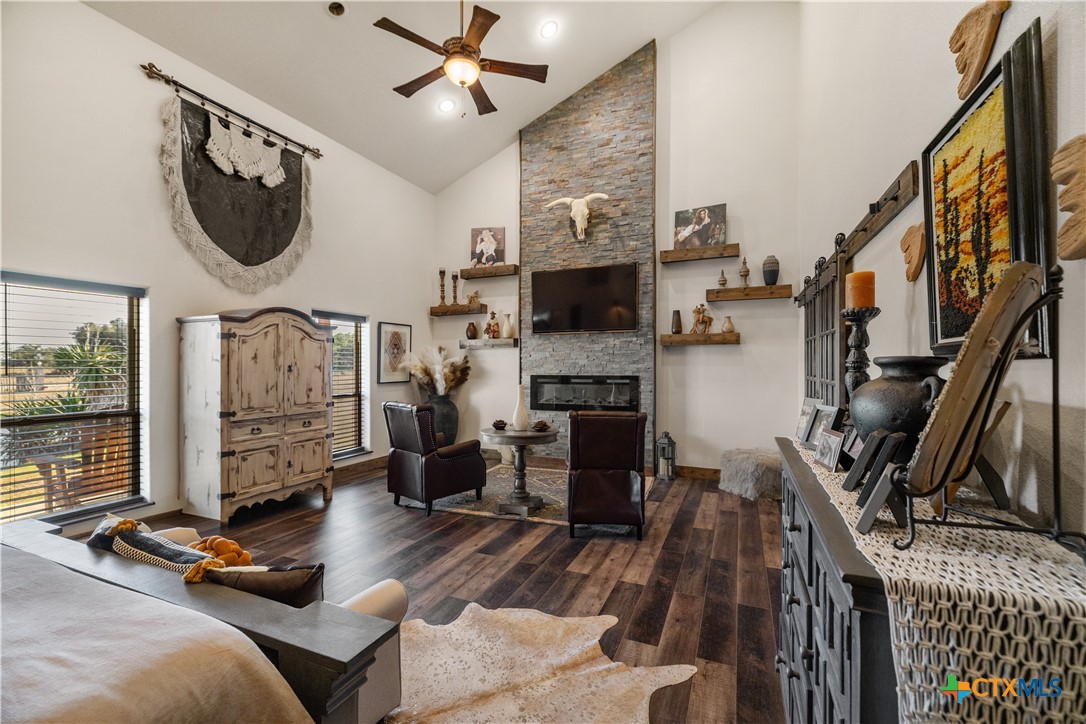 2796 Benbow Road Inez, TX 77968 - Photo 13 of 35 a living room with furniture a flat screen tv and a fireplace