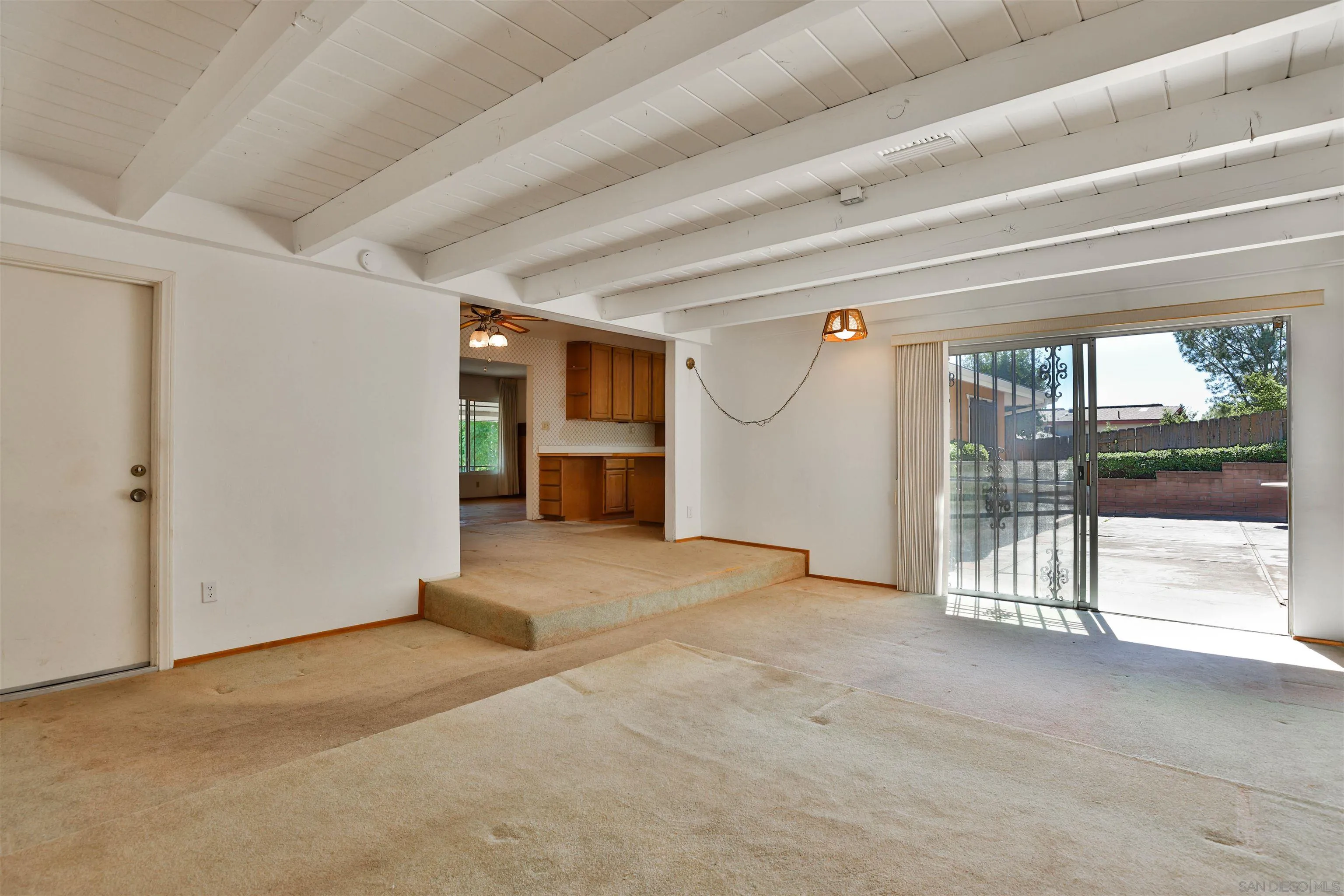 10320 Rancho Road La Mesa, CA 91941 - Photo 19 of 43 a view of empty room with floor to ceiling window and stairs