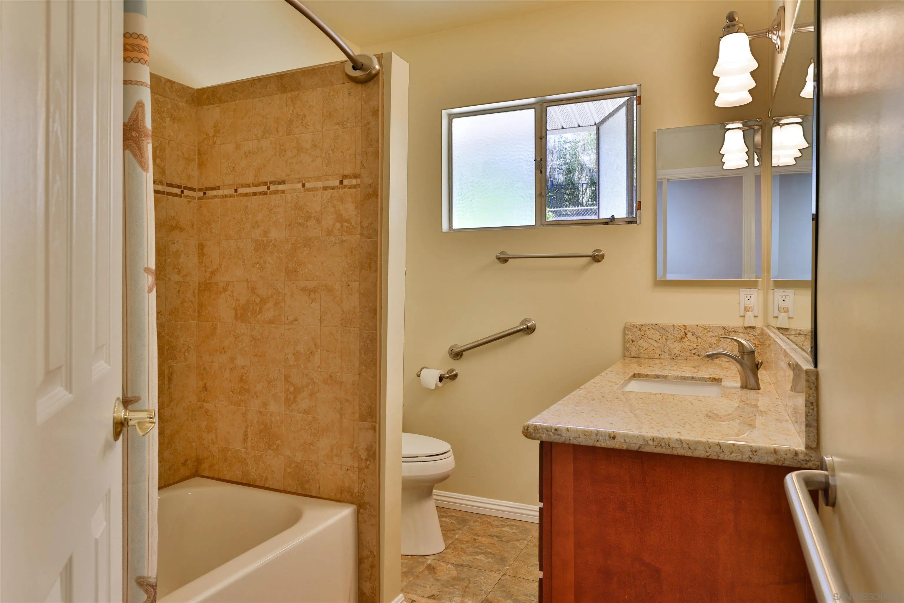 10320 Rancho Road La Mesa, CA 91941 - Photo 24 of 43 a bathroom with a granite countertop sink toilet and shower