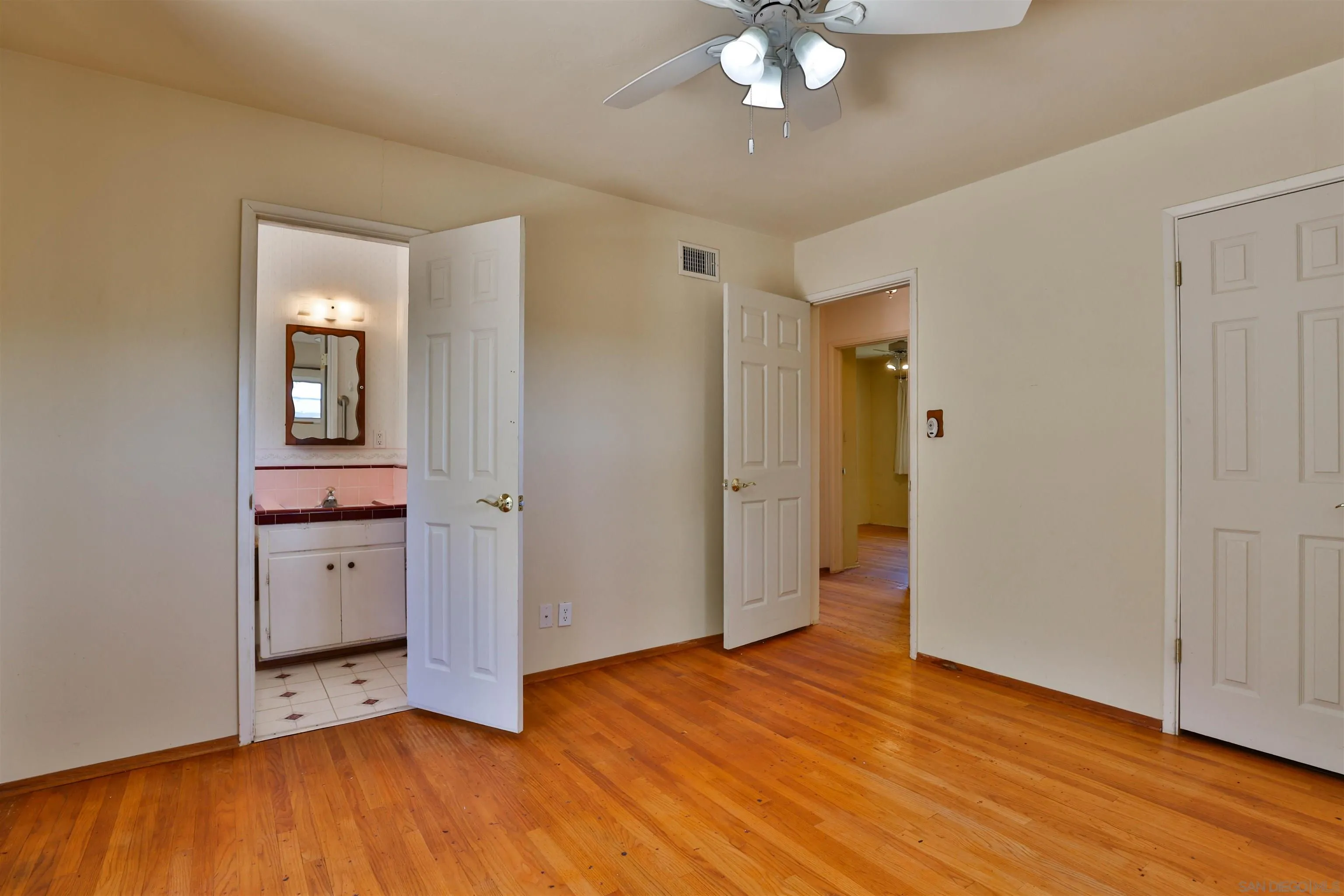 10320 Rancho Road La Mesa, CA 91941 - Photo 26 of 43 wooden floor in an empty room with a window