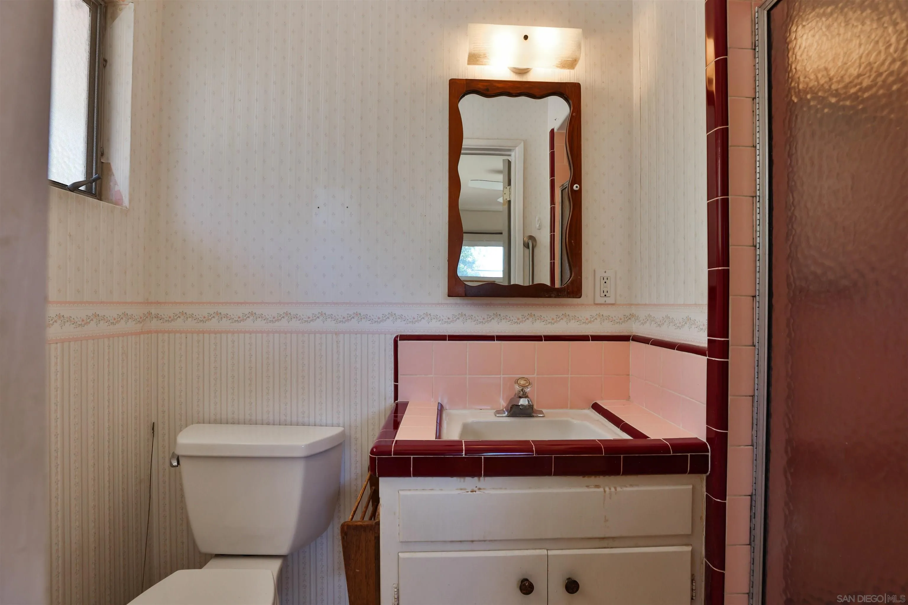 10320 Rancho Road La Mesa, CA 91941 - Photo 30 of 43 a bathroom with a toilet and a sink