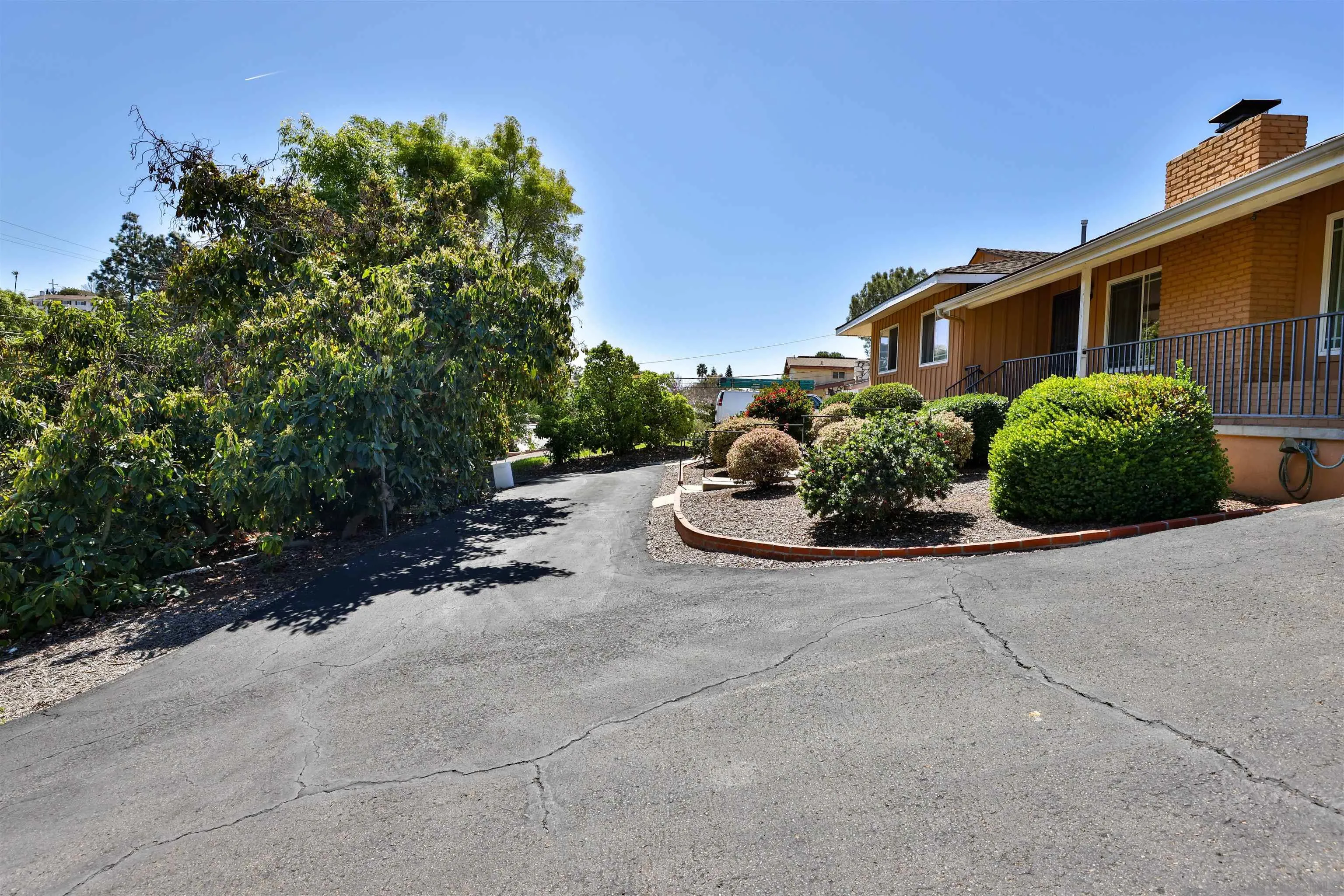 10320 Rancho Road La Mesa, CA 91941 - Photo 4 of 43 a view of a house with backyard and garden