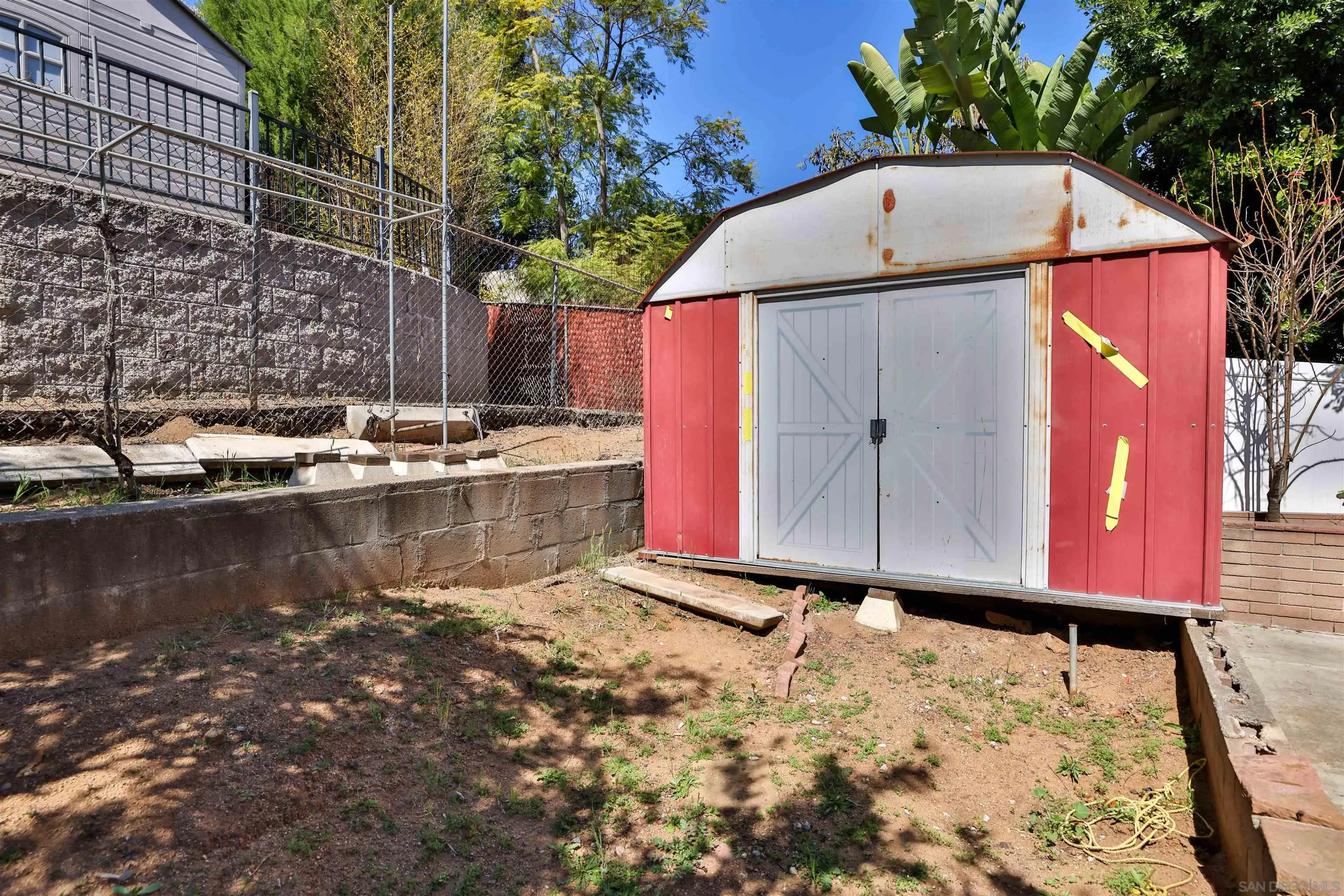 10320 Rancho Road La Mesa, CA 91941 - Photo 43 of 43 a view of a house with a yard and sitting area