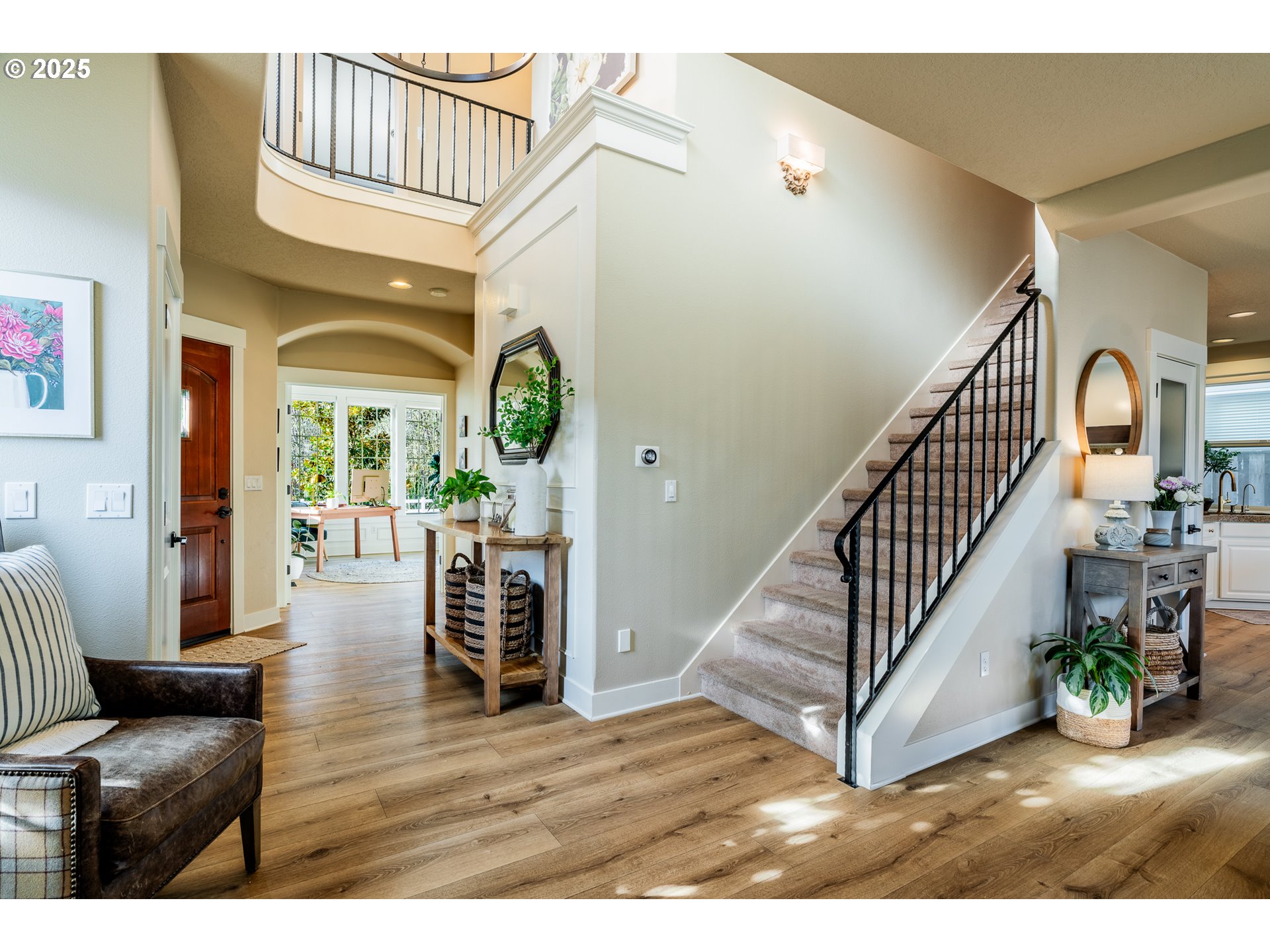 16472 Southwest 133rd Terrace Tigard, OR 97224 - Photo 2 of 48 a view of entryway and hall with wooden floor