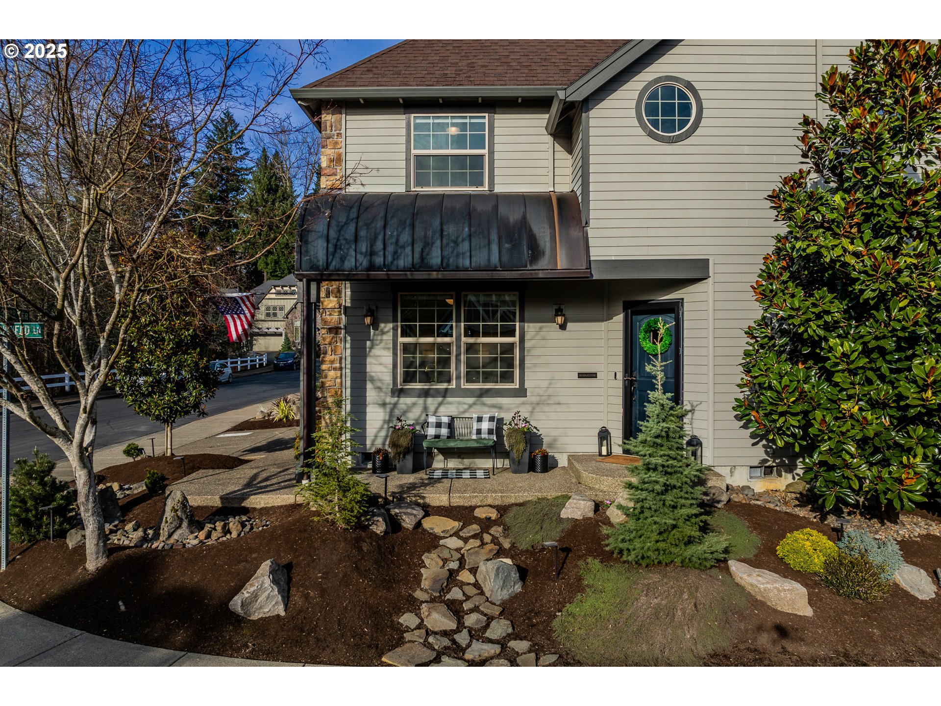 16472 Southwest 133rd Terrace Tigard, OR 97224 - Photo 35 of 48 a front view of a house with a garden