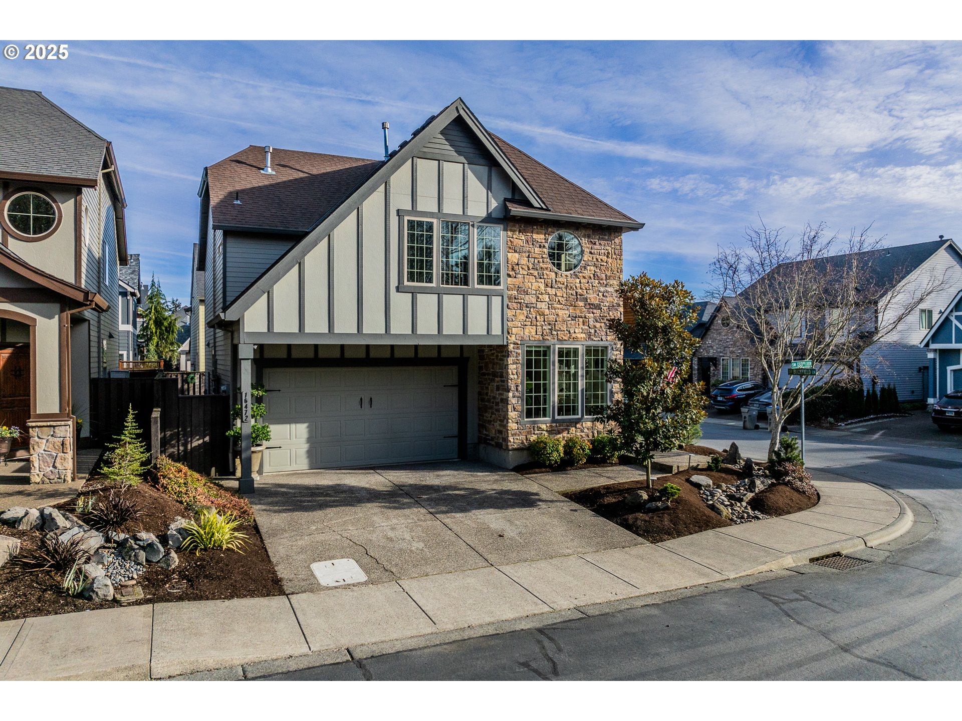 16472 Southwest 133rd Terrace Tigard, OR 97224 - Photo 36 of 48 a view of a house with a patio