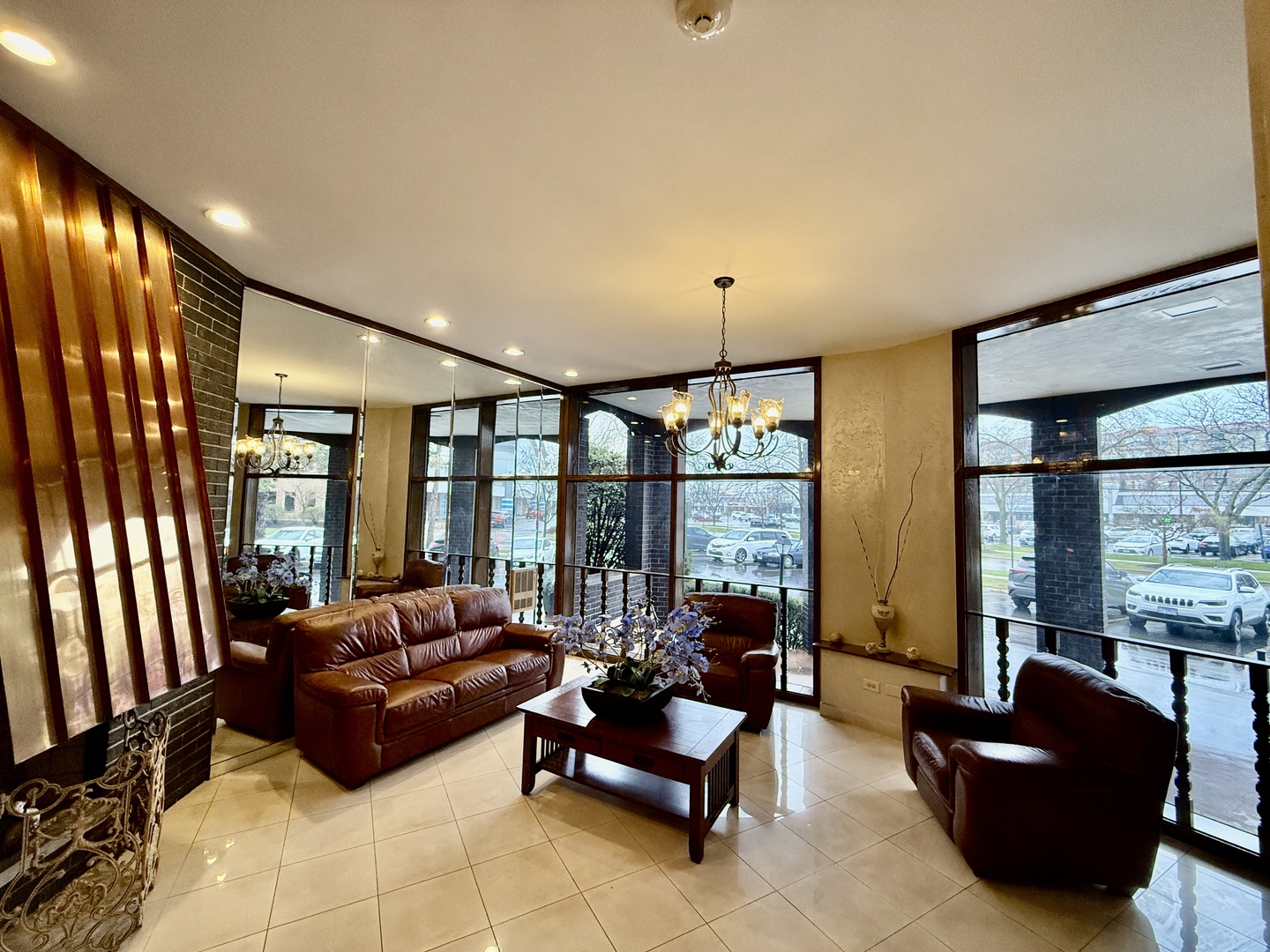 4900 Foster Street, Unit 407 Skokie, IL 60077 - Photo 3 of 3 a living room with furniture and a large window