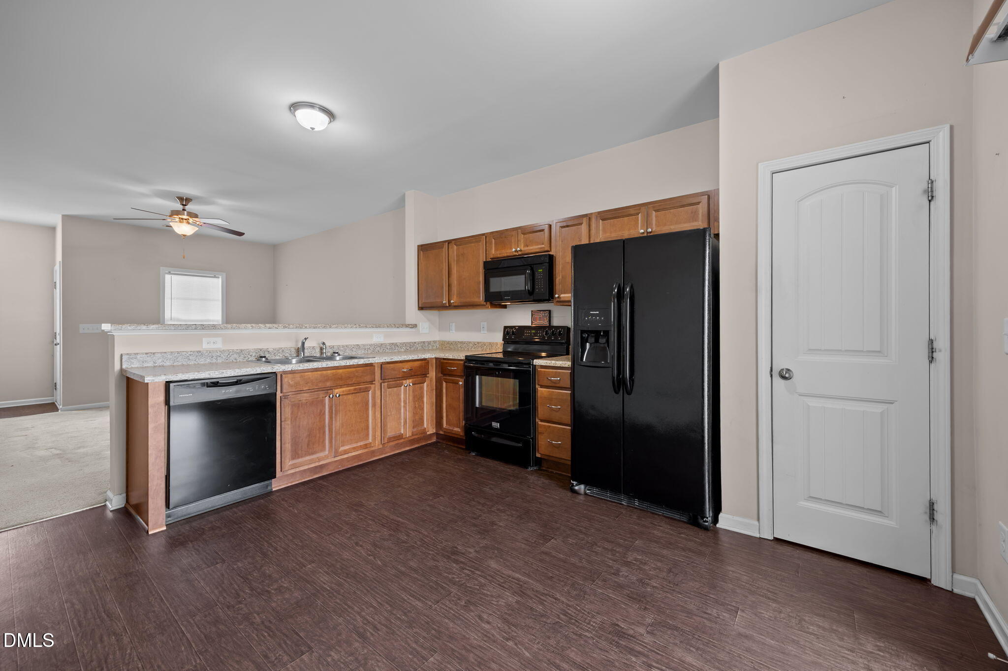 504 Winston Way Creedmoor, NC 27522 - Photo 20 of 45 a kitchen with a refrigerator and a sink