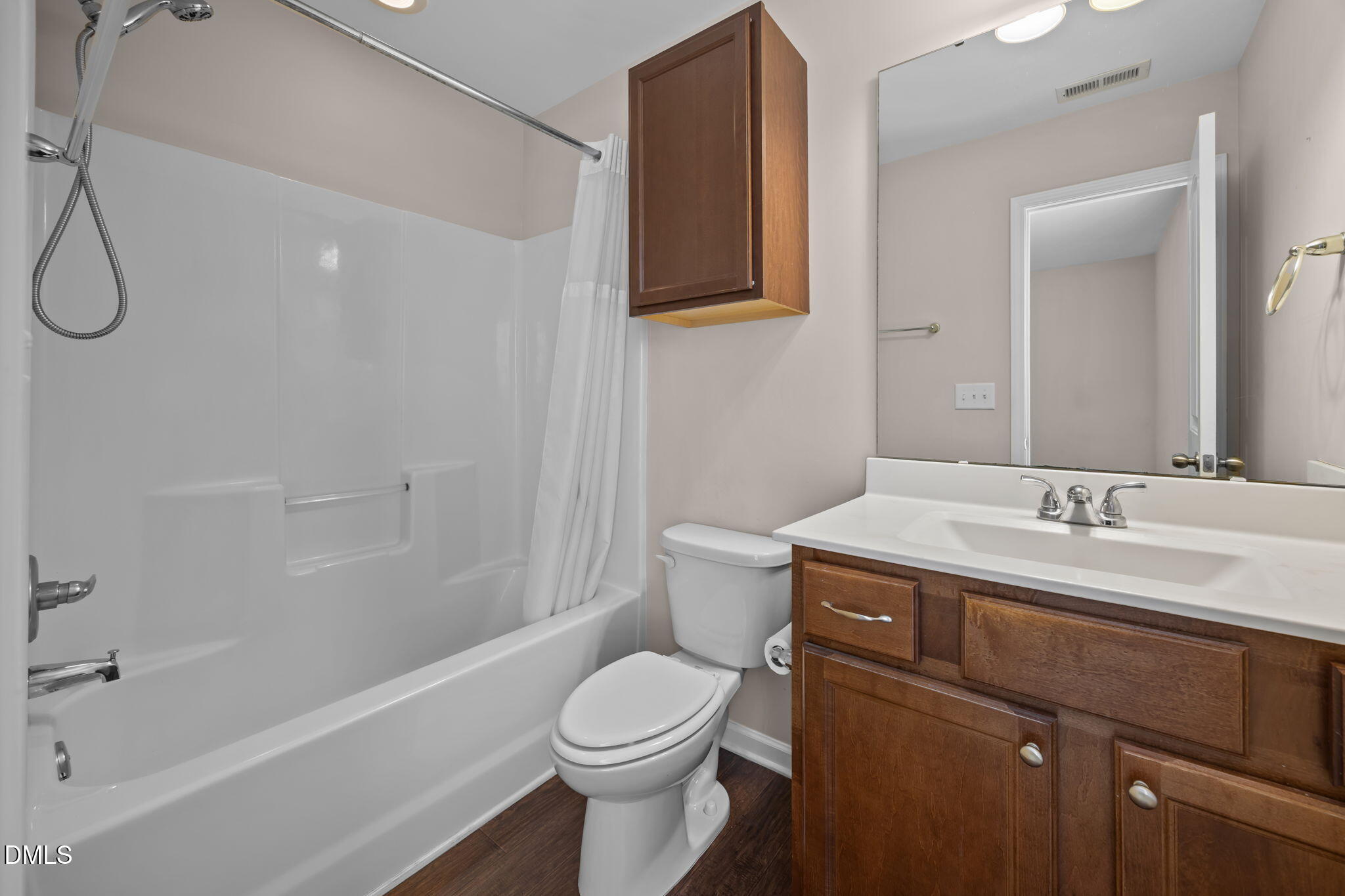 504 Winston Way Creedmoor, NC 27522 - Photo 32 of 45 a bathroom with a sink toilet vanity and shower