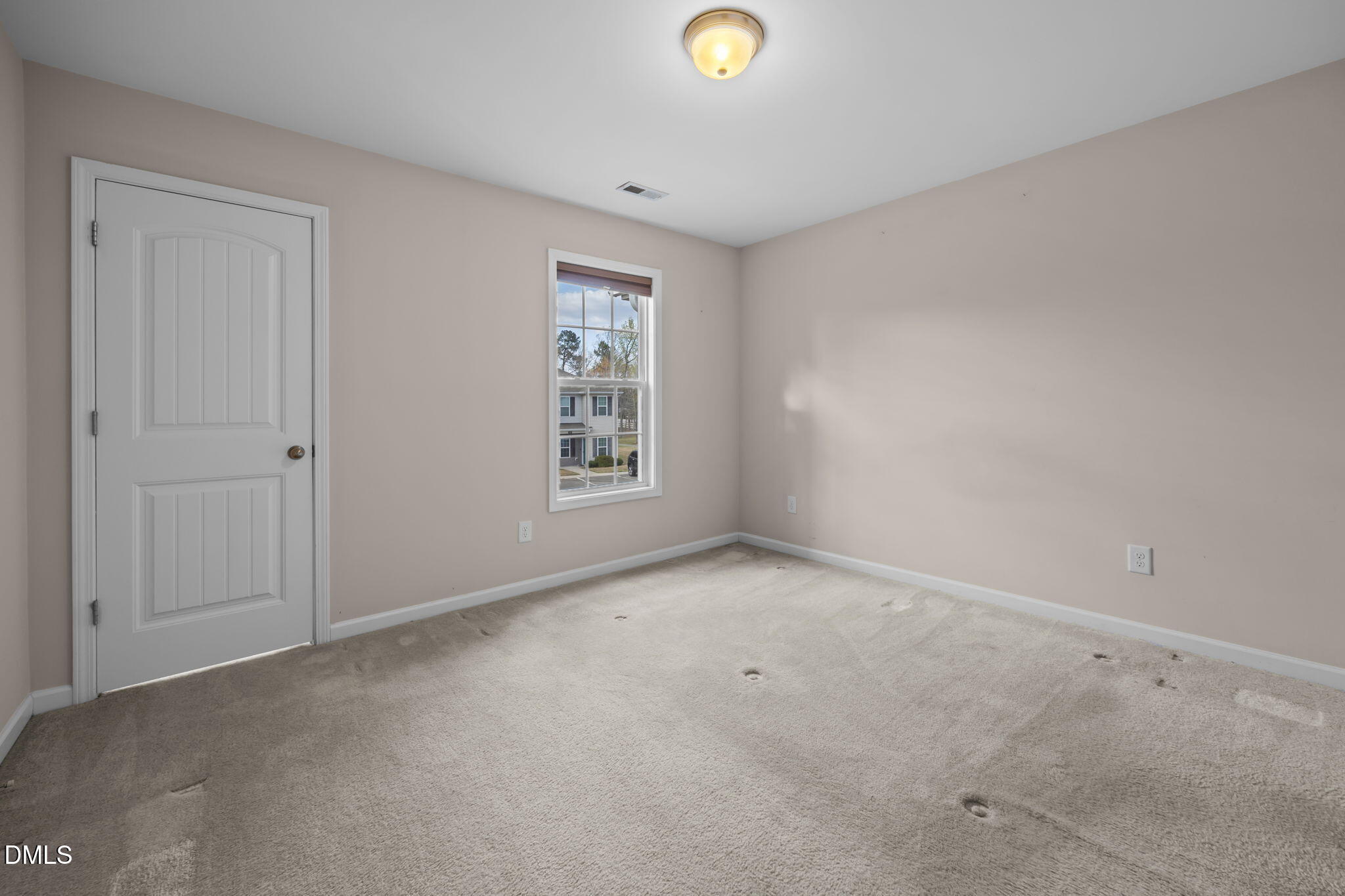 504 Winston Way Creedmoor, NC 27522 - Photo 34 of 45 an empty room with windows