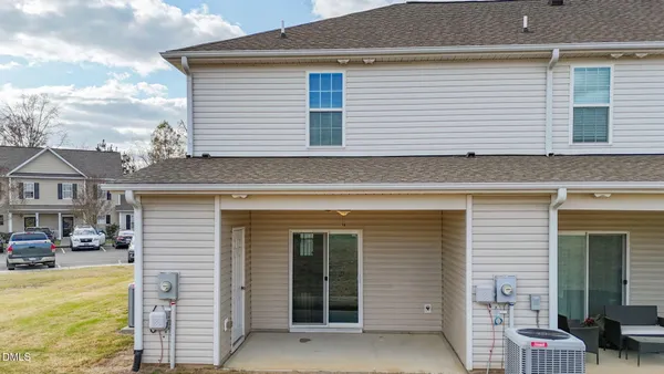 front view of a house with a patio