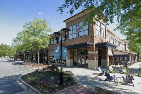 a front view of a building with street view