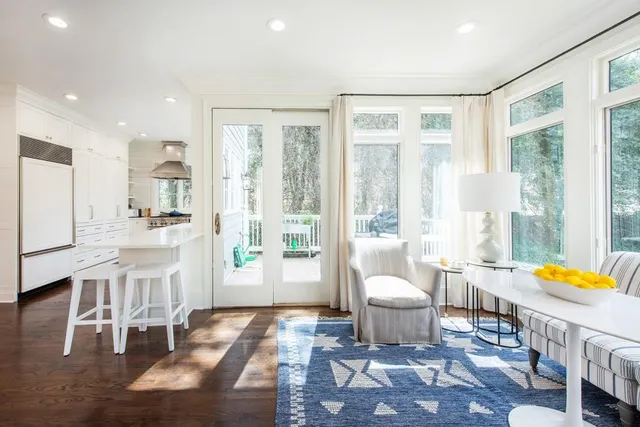 a living room with furniture and a table