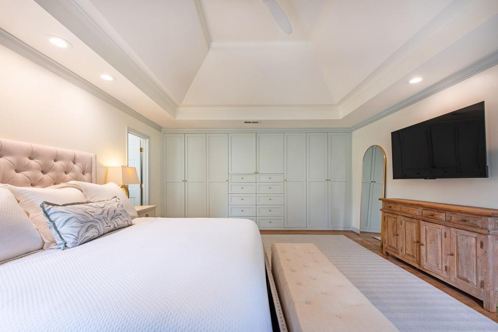 3211 Circle Oaks Drive Southeast Atlanta, GA 30339 - Photo 25 of 50 a bedroom with a bed and a flat screen tv