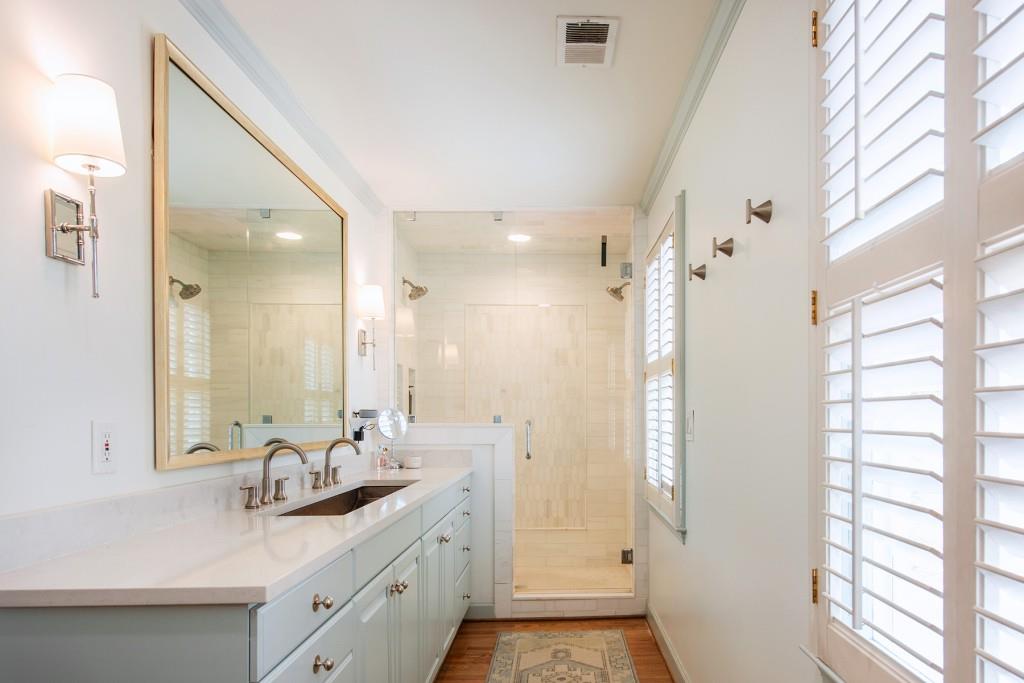 3211 Circle Oaks Drive Southeast Atlanta, GA 30339 - Photo 27 of 50 a bathroom with a double vanity sink mirror and double