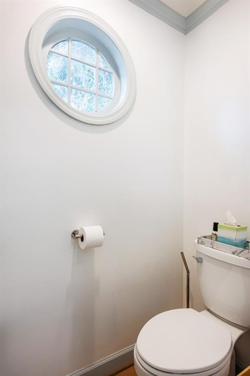 3211 Circle Oaks Drive Southeast Atlanta, GA 30339 - Photo 29 of 50 a white toilet sitting next to a shower curtain